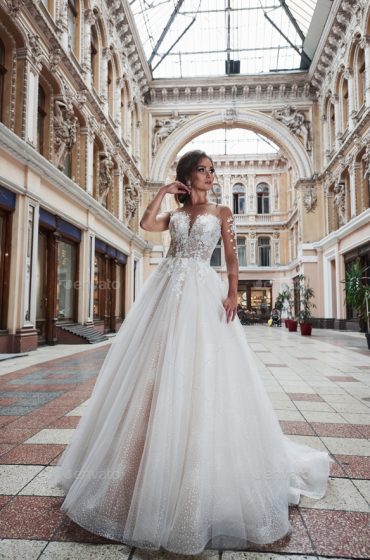 Beautiful delicate young woman, sexy bride in luxurious wedding dress.